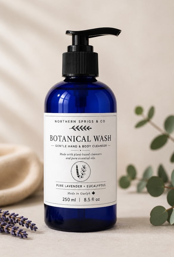 Pure Lavender + Eucalyptus Botanical Wash in a 250 mL amber bottle by Northern Sprigs & Co., handcrafted plant-based body and hand wash with pure essential oils.